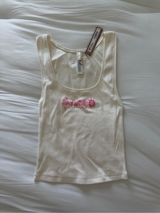 SKIMS Tops - SKIMS Cream Ribbed Tank with Pink Floral Logo